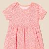 imageAmazon Essentials Baby Girls Short Sleeve Bodysuit Dress Pack of 3Pale YellowFloral