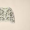 imageAmazon Essentials Girls and Toddlers Knit CardiganIvory Leopard Animal