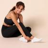 imageAmazon Essentials Womens Athletic Grip Ankle Socks 4 PairsWhite