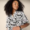 imageAmazon Essentials Womens RelaxedFit Fluid Twill ButtonDown Shirt Short Sold SeparatelyBlack Ivory Folk Floral