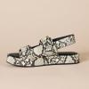 imageAmazon Essentials Womens Adjustable Triple Strap Flat Platform SandalMulti Faux Snake Skin
