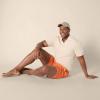 imageAmazon Essentials Mens 7quot QuickDry Swim TrunkCaramel Coral Tropical Leaves