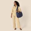 imageAmazon Essentials x Sofia Grainge Womens Quilted Tote BagNavy
