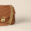 imageAmazon Essentials Soft Quilted Flap BagDark Brown Nylon