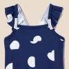 imageAmazon Essentials Baby Girls Frill OnePiece SwimsuitDeep Blue Ivory Abstract Dots