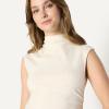 imageAmazon Essentials Womens SlimFit Sleeveless HighNeck TopCream