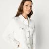 imageAmazon Essentials Womens RegularFit Low Stretch Denim ButtonFront Trucker JacketWhite