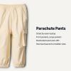 imageAmazon Essentials BabyBoys Nylon Parachute PantsBeige