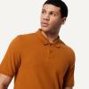image:imageAmazon Essentials Mens RegularFit Short Sleeve Cotton Pique Polo Shirt Available in Big amp TallCaramel