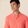 image:imageAmazon Essentials Mens RegularFit Short Sleeve Cotton Pique Polo Shirt Available in Big amp TallCoral Orange