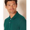 image:imageAmazon Essentials Mens RegularFit Short Sleeve Cotton Pique Polo Shirt Available in Big amp TallEvergreen