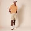 image:imageAmazon Essentials Mens RegularFit Short Sleeve Cotton Pique Polo Shirt Available in Big amp TallTan