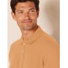image:imageAmazon Essentials Mens RegularFit Short Sleeve Cotton Pique Polo Shirt Available in Big amp TallTan