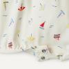 image:imageAmazon Essentials x Sofia Grainge Baby Girls Cotton Short Sleeve Romper with Peter Pan CollarSailboatsUneven Stripe
