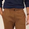image:imageAmazon Essentials Mens RelaxedFit Fleece Joggers SweatpantsDark Tan