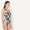 image:imageAmazon Essentials Womens CrissCross Back OnePiece SwimsuitCream Black Floral