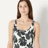 image:imageAmazon Essentials Womens OnePiece Scoop Neck Coverage Swimsuit Available in Plus SizeCream Black Floral