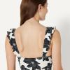 image:imageAmazon Essentials Womens Ruffle VNeck OnePiece SwimsuitCream Black Floral