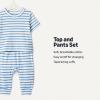 image:imageAmazon Essentials x Sofia Grainge Unisex Toddlers and Babies Cotton Knit Short Sleeve Shirt amp Pants SetBlue Ivory Uneven Stripe
