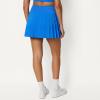image:imageAmazon Essentials Womens Performance Stretch Woven Pleated Tennis Skirt with Builtin Shorts and PocketsBlue
