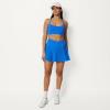 image:imageAmazon Essentials Womens Performance Stretch Woven Pleated Tennis Skirt with Builtin Shorts and PocketsBlue