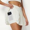 image:imageAmazon Essentials Womens Performance Stretch Woven Pleated Tennis Skirt with Builtin Shorts and PocketsWhite