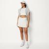 image:imageAmazon Essentials Womens Performance Stretch Woven Pleated Tennis Skirt with Builtin Shorts and PocketsWhite