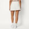 image:imageAmazon Essentials Womens Performance Stretch Woven Pleated Tennis Skirt with Builtin Shorts and PocketsWhite