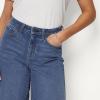 image:imageAmazon Essentials Womens RelaxedFit MidRise Long Jean ShortsMedium Blue Vintage