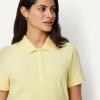 image:imageAmazon Essentials Womens ShortSleeve Polo Shirt Soft Stretch Cotton Jersey Available in Plus SizePastel Yellow