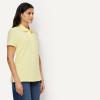 image:imageAmazon Essentials Womens ShortSleeve Polo Shirt Soft Stretch Cotton Jersey Available in Plus SizePastel Yellow
