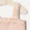 image:imageAmazon Essentials x Sofia Grainge Baby Girls Woven Sleeveless Ruffle RomperPeach Classic Stripe