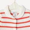 image:imageAmazon Essentials x Sofia Grainge Toddlers and Baby Girls Cotton Short Sleeve Button Front Sweater with Peter Pan CollarIvory Red Uneven Stripe