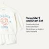 image:imageAmazon Essentials x Sofia Grainge Unisex Babies Toddlers and Kids Sweatshirt and Shorts French Terry Play SetIvory Marine Club