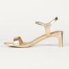 image:imageAmazon Essentials Womens Ankle Strap Low Heel SandalsMetallic Gold Faux Snake