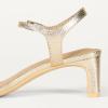 image:imageAmazon Essentials Womens Ankle Strap Low Heel SandalsMetallic Gold Faux Snake