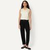 image:imageAmazon Essentials Womens RegularFit Sleeveless ButtonDown BlouseEggshell White