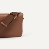image:imageAmazon Essentials Womens Lightweight Clutch Crossbody BagTan