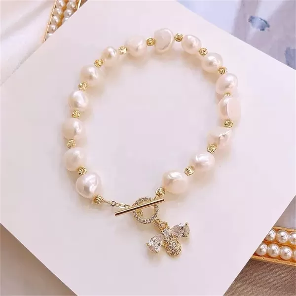 Dainty Pearl Bee Bracelet for Petite Women Girls Gold Plated Cubic Zirconia Honeybee Geometric Imitation Pearls Ball Bead OT Clasp Handmade Charm Chain Baroque Retro Jewelry Gifts for Daughter NieceDainty Pearl Bee Bracelet for Petite Women Girls Gold Plated Cubic Zirconia Honeybee Geometric Imitation Pearls Ball Bead OT Clasp Handmade Charm Chain Baroque Retro Jewelry Gifts for Daughter Niece