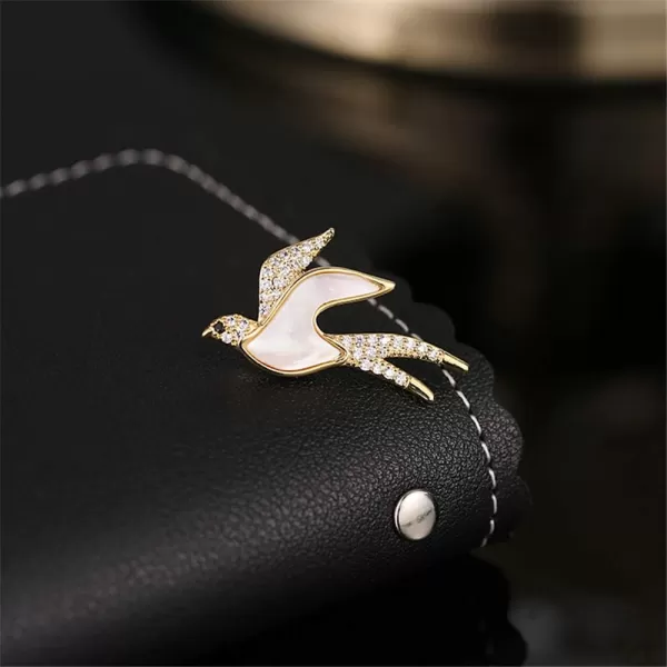 Crystal Swallow Bird Brooch Pin for Women Girls Fashion Gold Tone Imitation Shell Cute Animal Lapel Pin Scarf Clip Necktie Dress Accessories Dekoration Jewelry Dainty Gift for Daughter DadCrystal Swallow Bird Brooch Pin for Women Girls Fashion Gold Tone Imitation Shell Cute Animal Lapel Pin Scarf Clip Necktie Dress Accessories Dekoration Jewelry Dainty Gift for Daughter Dad