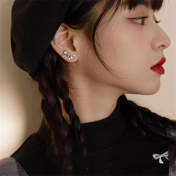 imageAsymmetrical Angel Evil Earrings 925 Sterling Silver Small Cute Love Heart Wings Cartilage Studs Earring for Women Imitation Moon Stone Mismatch White and Black Ear Jewelry Gifts for Daughter Niece
