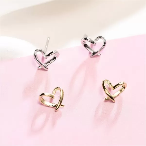 imageMinimalist Golden Heart Sterling Silver Earrings for Women Girls Charm Hollow Love Hearted Stud Tiny Small Cartilage Tragus Post Pin Hypoallergenic Pierced Ear Christmas Birthday Halloween Thanksgiving Jewelry Gifts