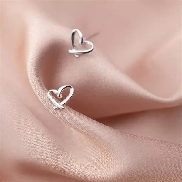 imageMinimalist Heart Sterling Silver Earrings for Women Girls Teens Charm Hollow Love Hearted Stud Tiny Small Cartilage Tragus Post Pin Hypoallergenic Pierced Ear Christmas Birthday Halloween Thanksgiving Jewelry Gifts