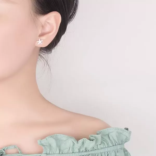 imageHuggie Starfish Stud Earrings for Women S925 Sterling Silver SilverToned Dainty Charm Tiny Small Star Sea Coral Starfish Earrings Post Pin Hypoallergenic Beach Jewelry Gift