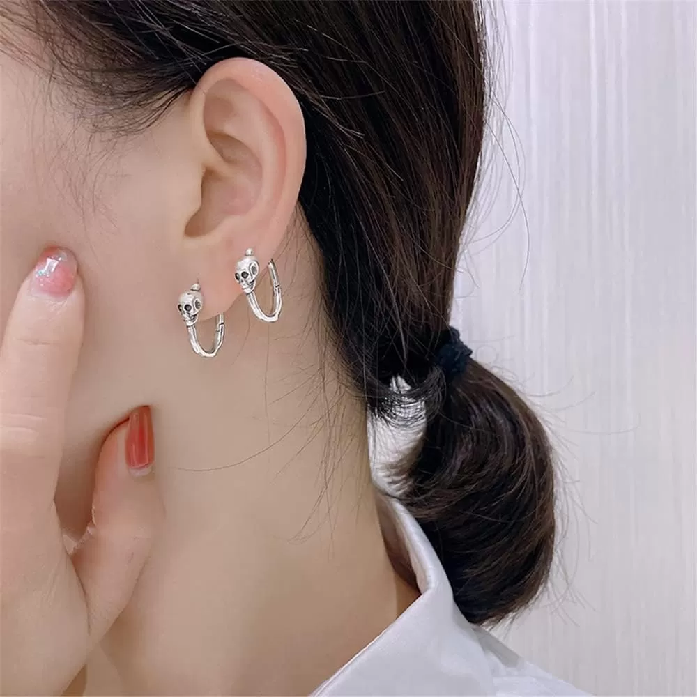 imageMinimalist Skull Hoop Earrings for Women Unisex Silver Tone Small Cartilage Huggie Hoops Hypoallergenic Vintage Gothic Halloween Jewelry