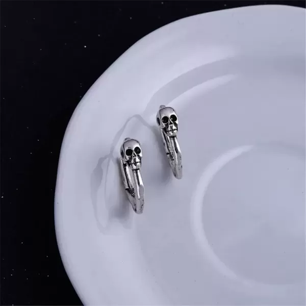 imageMinimalist Skull Hoop Earrings for Women Unisex Silver Tone Small Cartilage Huggie Hoops Hypoallergenic Vintage Gothic Halloween Jewelry