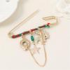 imageCute Gold Christmas Brooch Pin for Women Girls Rhinestone Enameled Green Red Santa Claus Star Flower Wreath Tassel Chain Drop Dangle Lapel Pins Sweater Shawl Dress Accessories Xmas Jewelry Gift
