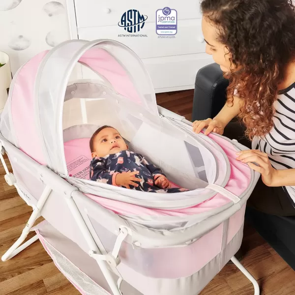 Karley Bassinet in Cool Grey, Lightweight Portable Baby Bassinet, Quick Fold and Easy to Carry , Adjustable Double Canopy, Indoor and Outdoor Bassinet with Large Storage Basket.