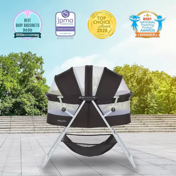 Karley Bassinet in Cool Grey, Lightweight Portable Baby Bassinet, Quick Fold and Easy to Carry , Adjustable Double Canopy, Indoor and Outdoor Bassinet with Large Storage Basket.