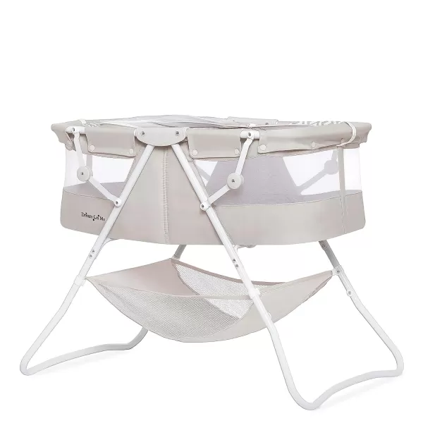 Karley Bassinet in Cool Grey, Lightweight Portable Baby Bassinet, Quick Fold and Easy to Carry , Adjustable Double Canopy, Indoor and Outdoor Bassinet with Large Storage Basket.